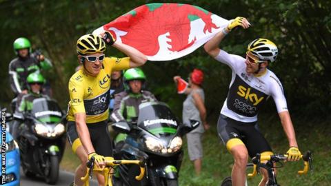 Geraint Thomas and Luke Rowe flying Wales flag