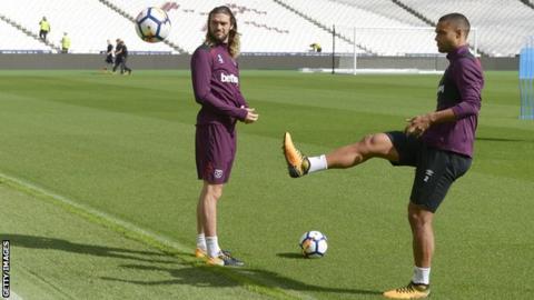 Andy Carroll and Winston Reid