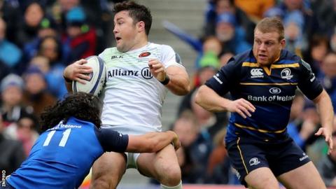 Leinster's James Lowe tackles Saracens centre Brad Barritt in last year's Champions Cup quarter-final as Sean Cronin looks on
