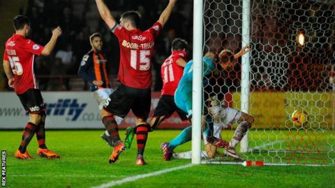 Paul Benson bundles home Luton Town's 100th-minute winner