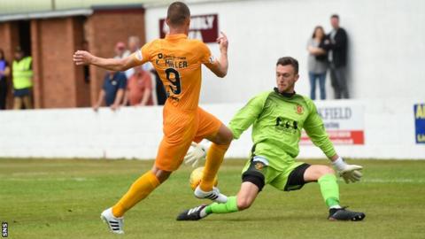 Livingston player-manager Kenny Miller scores against Annan Athletic