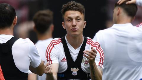 Russia's midfielder Aleksandr Golovin gestures during a training session