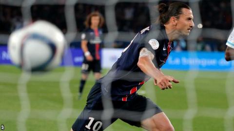 Zlatan Ibrahimovic celebrates scoring a penalty for Paris St-Germain