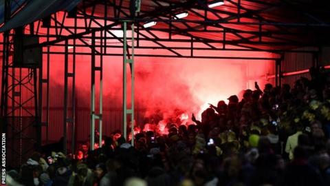 The red flare at the Hyde United-MK Dons went off in the home end