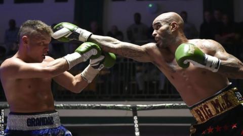 Leon McKenzie (right) fights John McCallum