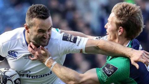 Leinster's Rob Kearney is challenged by Kieran Marmion of Connacht