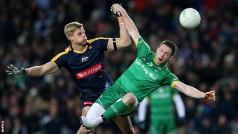 Australia's Nick Riewoldt battles with Ireland's Michael Quinn at Croke Park