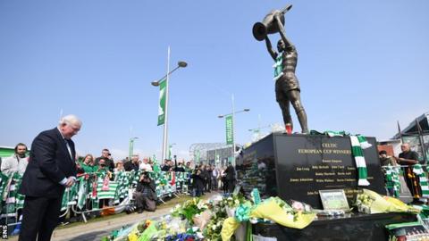 Rangers legend John Greig lays a wreath at Billy McNeill's statue