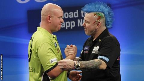 Peter Wright congratulates Michael van Gerwen