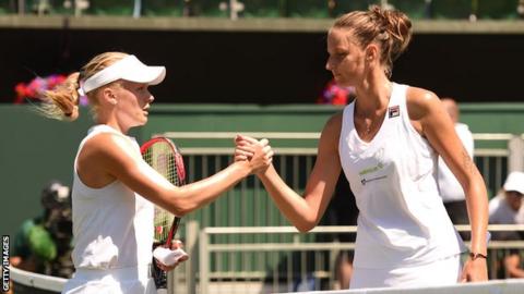 Harriet Dart shakes hands with Karolina Pliskova at Wimbledon