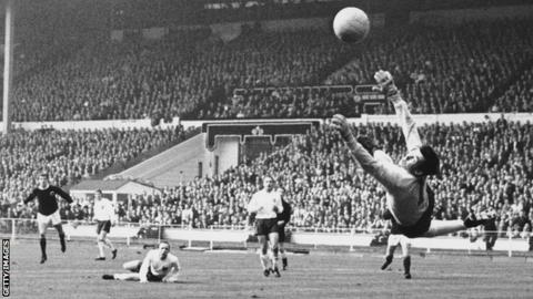 England goalkeeper Gordon Banks saves a shot from Denis Law