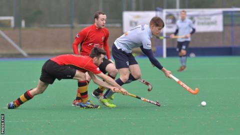 Banbridge's Jonny McKee challenges Monkstown opponent Kark Smith in Saturday's 1-1 draw