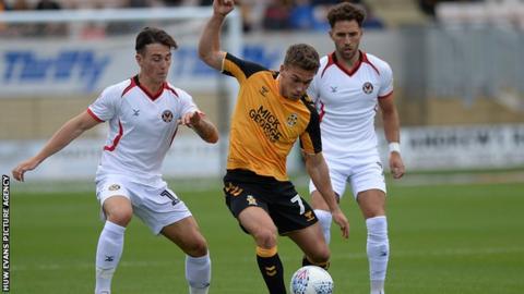 Luke Hannant of Cambridge in action against Newport