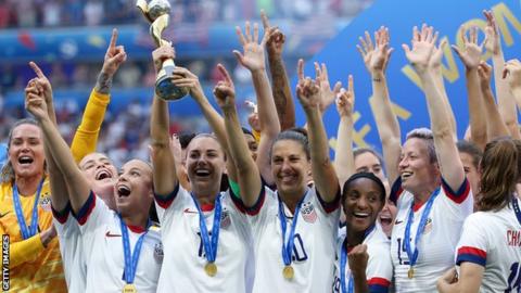 The US women's team celebrate their World Cup win