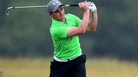 Paul Dunne plays his second shot to the fifth hole in the final round
