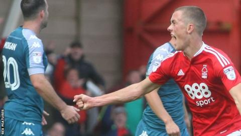 Thomas Lam celebrates a goal for Nottingham Forest