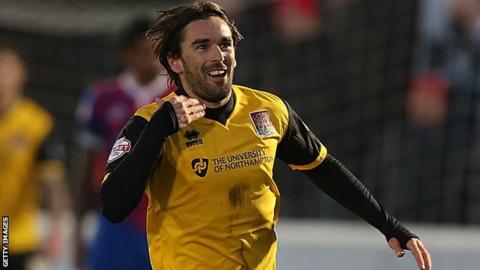 Ricky Holmes celebrates his winner for Northampton