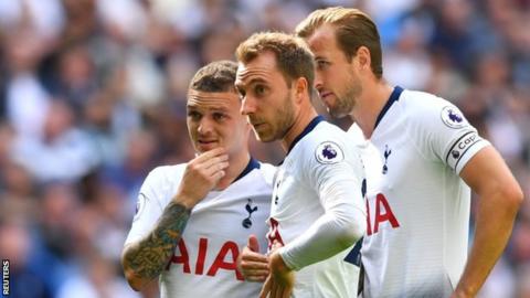 England players Harry Kane and Kieran Trippier talks with Denmark's Christian Eriksen