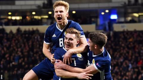 Scotland's Stuart Armstrong, James Forrest and Ryan Christie celebrate