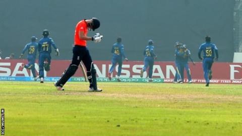 Ryan Davies walks off after his dismissal