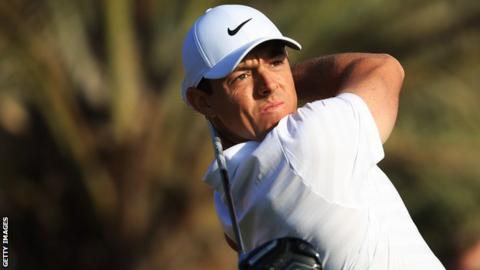 Rory McIlroy drives off the 14th tee in Abu Dhabi on Thursday