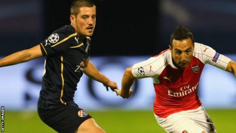 Arijan Ademi takes on Santi Carzola