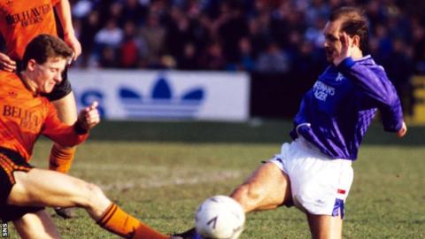 Ray Wilkins in action for Rangers against Dundee United