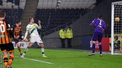 Tom Trybull watches his header drift wide