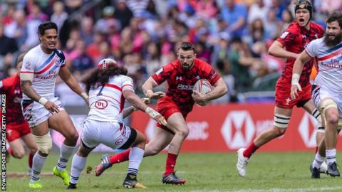 Afon Bagshaw runs with the ball during Hong Kong Sevens match between USA and Wales