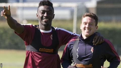 Hearts midfielders Prince Buaben and Danny Swanson