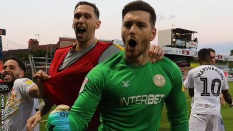 Joe Day celebrates after helping Newport reach Wembley