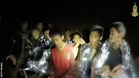 A video grab handout made available by the Thai Navy Seals shows some members of the trapped football team, 4 July 2018