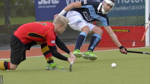 Lisnagarvey's Paul Gleghorne attempts to block a shot from Banbridge's Peter Brown at Comber Road