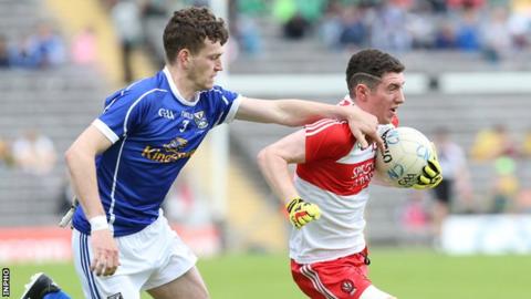 Tiarnan Flanagan battles with Cavan's Donal Monahan in the Ulster Minor Final