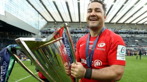 Saracens captain Brad Barritt holds the European Champions Cup