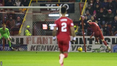 Gary Mackay-Steven (right) broke the deadlock at Pittodrie