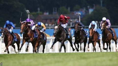 Horses in the closing stages of the Coral-Eclipse at Sandown