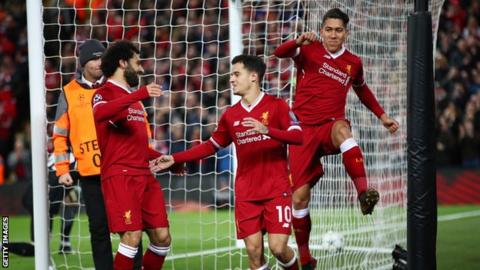 Philippe Coutinho celebrates his hat-trick goal against Spartak Moscow with Mohamed Salah and Roberto Firmino
