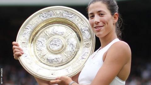 Garbine Muguruza with the Wimbledon women's singles trophy