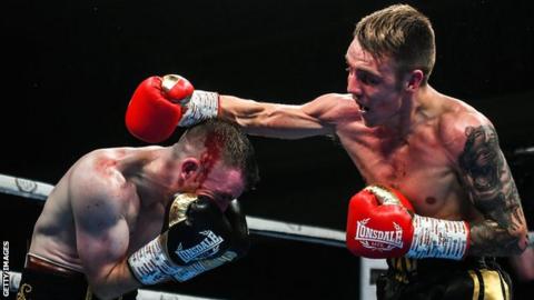 Jay Harris stopped Belfast's Paddy Barnes in four rounds to win the IBF Inter-Continental flyweight title