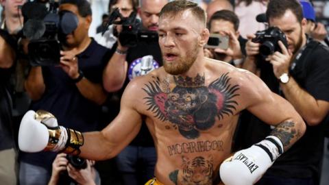 Conor McGregor trains in front of the media