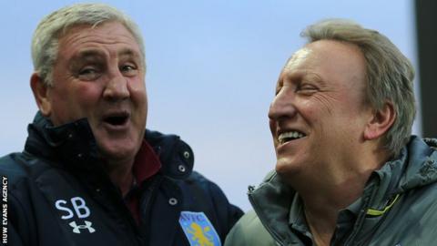 Neil Warnock (R) and Steve Bruce share a joke before kick off at Villa Park