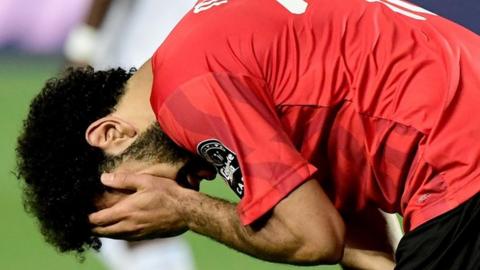 Mohamed Salah reacts to Egypt's early exit from the Nations Cup