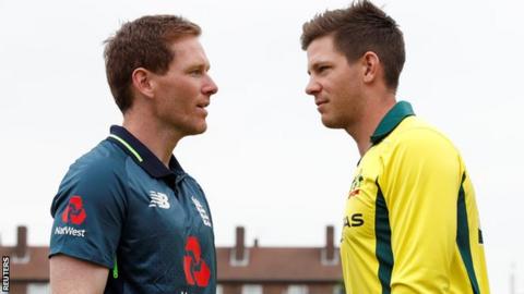 Eoin Morgan (left) with Tim Paine
