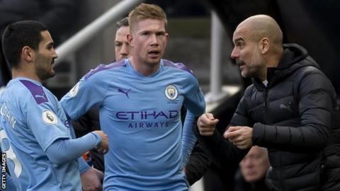 Manchester City boss Pep Guardiola (right)