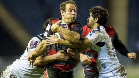 Edinburgh's Andries Strauss (centre) is tackled by Clement Darbo (left) and Alban Donduche