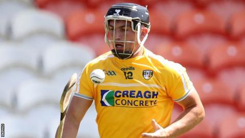 Nigel Elliott scored two goals for Antrim before being sent-off