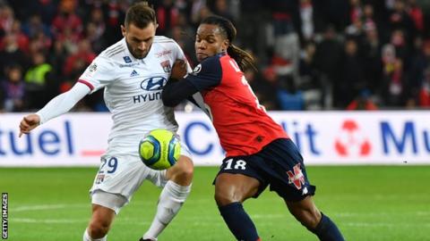 Lille's Portuguese midfielder Renato Sanches (R) vies with Lyon's French midfielder Lucas Tousart during the French L1 football match between Lille LOSC and Olympique Lyonnais at the Pierre-Mauroy stadium in Villeneuve-d'Ascq, near Lille, northern France.