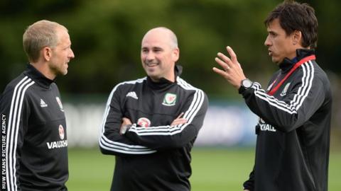 Paul Trollope and Chris Coleman during a Wales training session