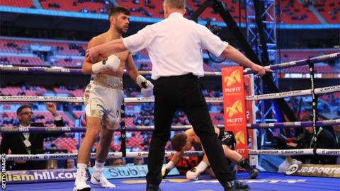 The referee calls a halt as Joe Cordina stops Sergej Vib inside a round at Wembley Stadium
